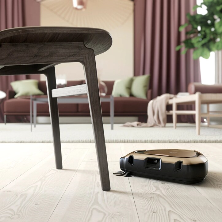 Robot vacuum cleaner i action on floor